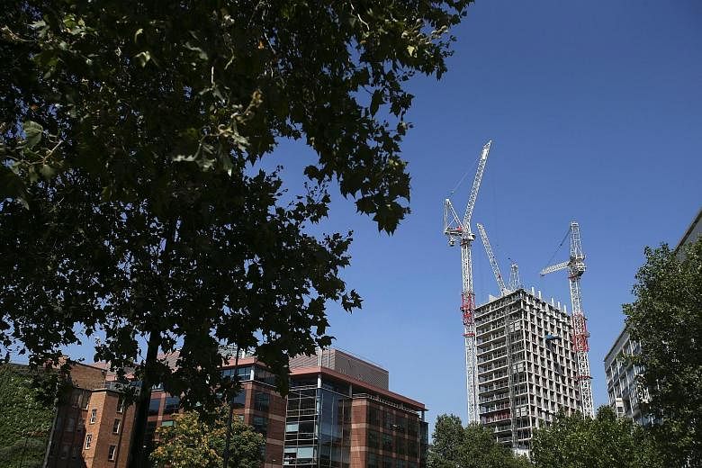 Chinese developers are showing more interest in properties in Britain, and China has begun talks on a free trade deal with Britain that would give Chinese firms greater access to the British economy. British Prime Minister Theresa May (front row, lef