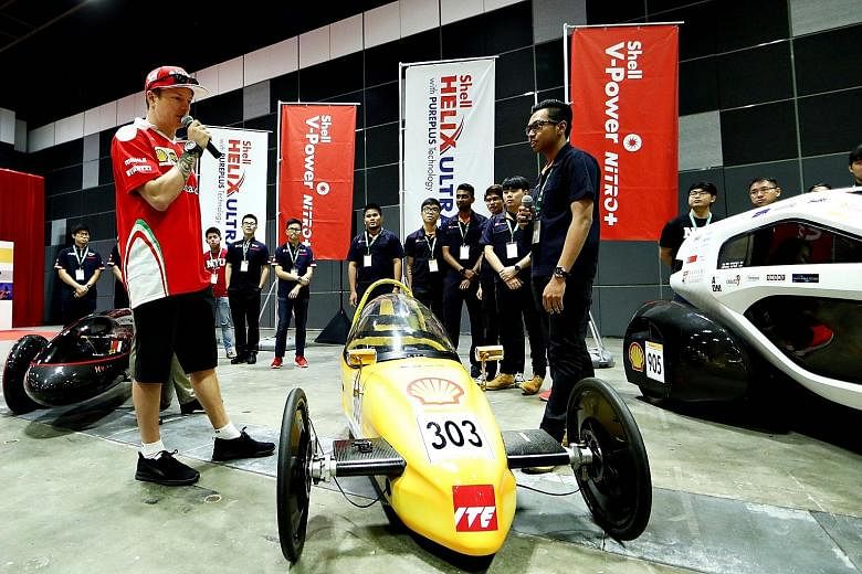 Kimi Raikkonen at the Shell Eco-marathon event on Thursday. Student teams from ITE and NTU got a chance last week to exchange ideas on fuel efficiency with the racing ace.