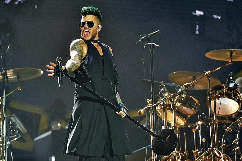 American singer Adam Lambert (above) shone with his flamboyant take on Queen's songs.