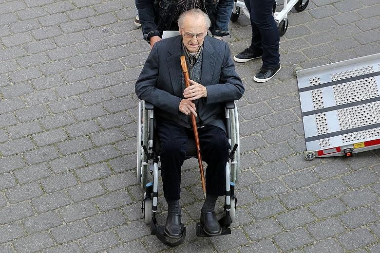 Former SS medic Hubert Zafke, 95, arriving for his trial last week in Neubrandenburg, Germany. He is accused of complicity in the murders of 3,681 inmates at Auschwitz concentration camp in Poland during World War II. Observers say these belated tria