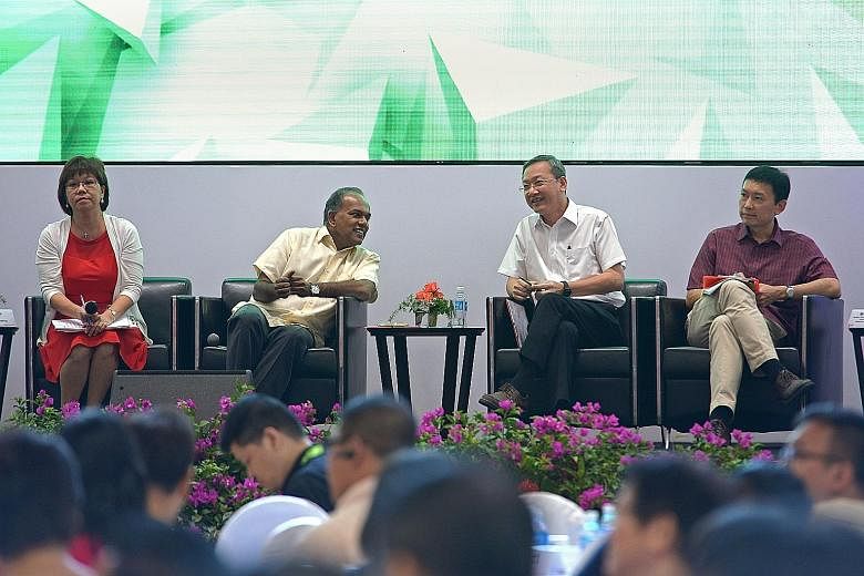 (From left) Central Singapore District Mayor Denise Phua, Mr Shanmugam, Minister of State Sam Tan and Minister of State Chee Hong Tat at a dialogue with grassroots leaders and residents at ITE College Central yesterday. The Government is updating the