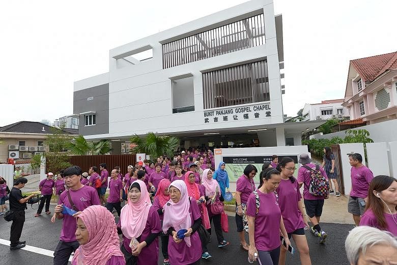 Participants of the Inter-Racial and Religious Confidence Circle Walk-In-Harmony at Bukit Panjang Gospel Chapel yesterday. More than 3,000 people from nine constituencies took part in the walk.