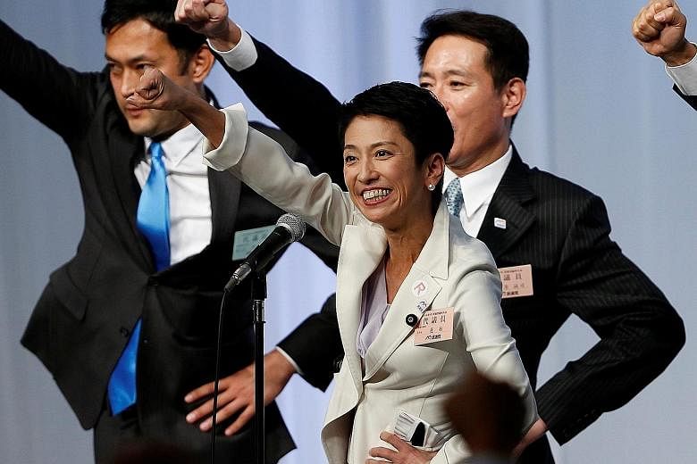 Ms Renho celebrating her election as DP leader last week. She is Japan's first female opposition leader in 30 years. She now has the tough task of repairing her party's reputation of being incompetent. Her plan, she says, is to propose actual counter