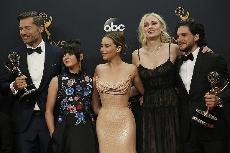From left: Nikolaj Coster-Waldau, Maisie Williams, Emilia Clarke, Sophie Turner and Kit Harington of HBO's Game Of Thrones, which won Outstanding Drama Series at the 68th Primetime Emmy Awards.