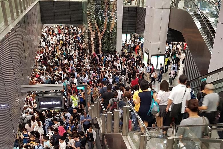 The crowd at Buona Vista MRT station early yesterday morning, during the single worst rail disruption in five months. SMRT said the fault was on the same track switch hit by a glitch on Sept 5.