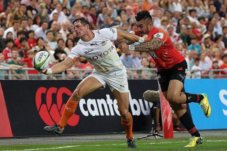 Sunwolves fly-half Tusi Pisi (right), seen tackling Cheetahs scrum-half Shaun Venter, will be returning with his team to play three more of their games at the National Stadium next season. The Sunwolves face a difficult season opener against the defe