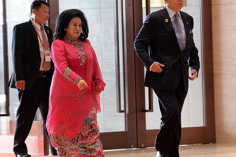 Mr Najib and his wife Rosmah Mansor, who was to receive an award for her work as patron of government body Permata. The awarding body later said it was deferring the award, a move Mr Najib's office said was due to a smear campaign by foreign papers c