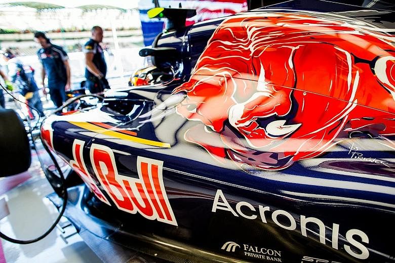 The logo of Acronis, a Singapore-based data back-up and protection company with offices around the world, emblazoned on the cars of Scuderia Toro Rosso. The Acronis-STR deal is a multi-year sponsorship.