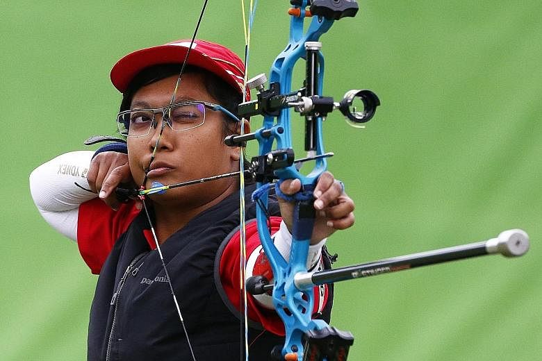Singapore's Nur Syahidah Alim shooting during the individual compound event in Rio. The para-archer shrugged off the loss of her shooting stool to reach the quarter-finals.