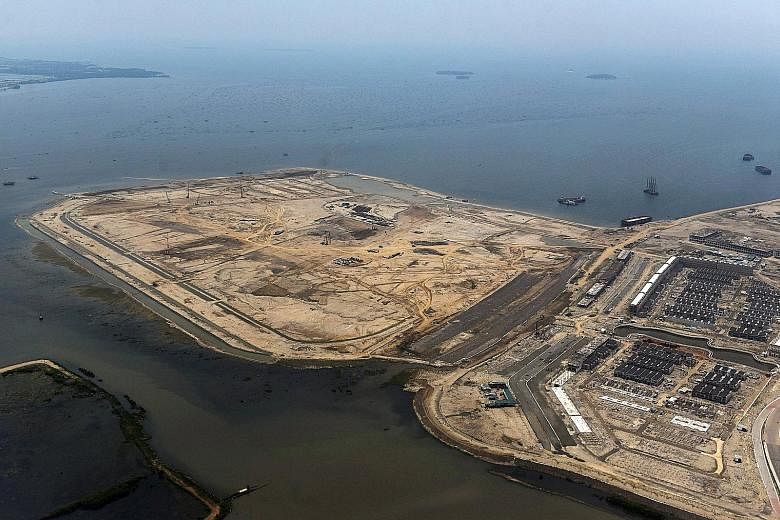 An aerial view of reclamation work in Jakarta Bay to build the wall. It is meant to protect the city from flooding and rising sea levels.