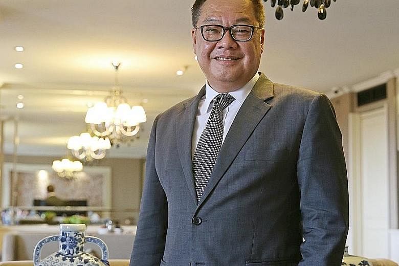Far East Hospitality chief executive Arthur Kiong says the company has leveraged technology and centralised key functions - such as finance - to improve its productivity and keep its workforce lean.