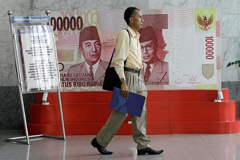 Bank Indonesia shaved 25 basis points off its seven-day reverse repurchase rate yesterday. The loosened monetary policy is to help bolster South-east Asia's biggest economy that is growing well below the 7 per cent target set by President Joko Widodo