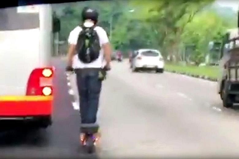 The video shows an e-scooter user riding on the left-most lane of a three-lane road. At one point, he veered past a bus, nipping in ahead of a taxi, before cutting back close in front of the bus. The incident was recorded on a phone camera in a car f