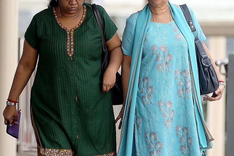 Jayasheela Jayaraman (left) was sentenced to 12 months' jail and ordered to pay $840 in compensation, while her mother Anpalaki Muniandy Marimuthu was sentenced to 16 months' jail. Both women, whose abuse left their maid scarred and with a permanent 
