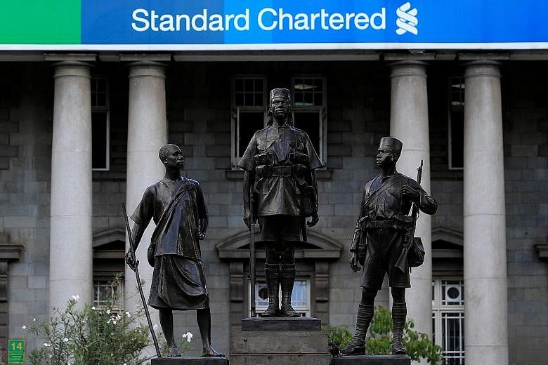 A pre-colonial era monument in front of Standard Chartered Bank in Kenya. The bank, which is focused on Africa, Asia and the Middle East, aims to offer innovative products and services to clients.