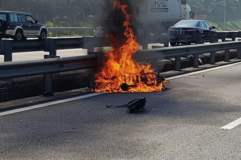 Mr Wong was a skilled rider and always put safety first, according to his friend and riding buddy. Mr Wong's motorcycle on fire yesterday on the North-South Expressway in Malaysia. It is believed that he was changing lanes and checking his blind spot