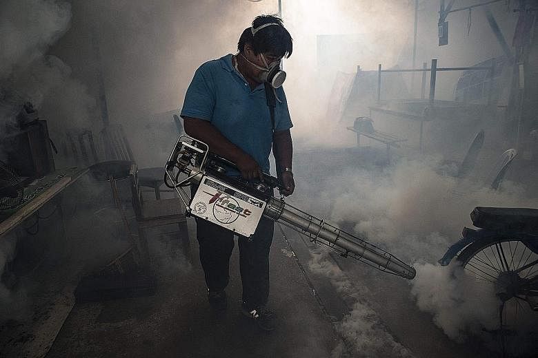 Fumigation in progress as Bangkok tries to control the spread of the Zika virus.