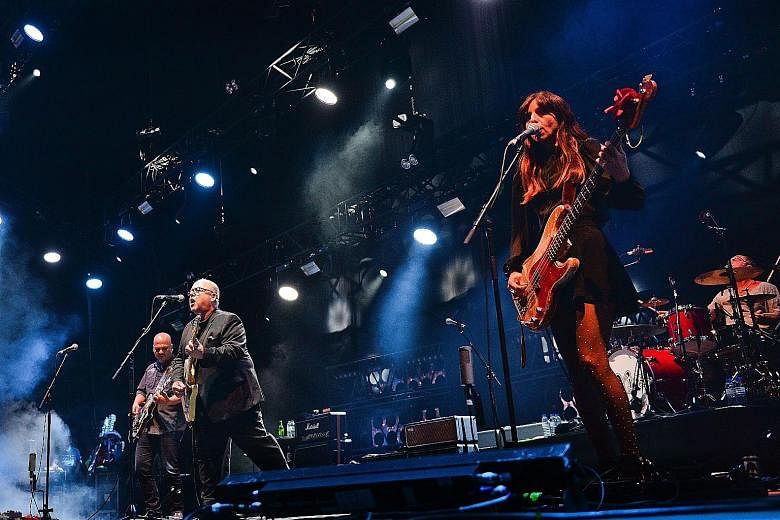 Pixies, comprising lead singer Black Francis (centre) and bassist Paz Lenchantin (right), have released their first proper studio album since they reunited in 2004.