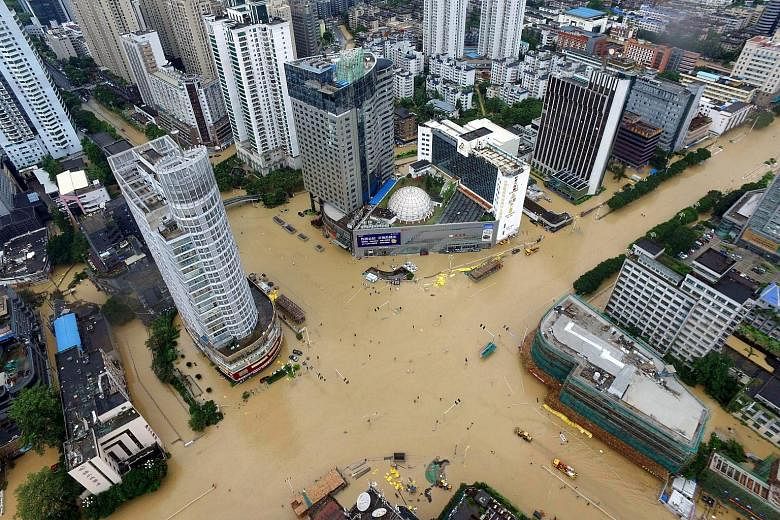 Floodwaters turned streets in Xiamen into rivers as Typhoon Megi swept through Fujian province yesterday.