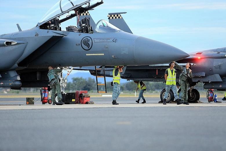 RSAF personnel at Rockhampton Airport preparing F-15 aircraft for a night mission during Exercise Wallaby 2016. This is the first time that F-15 fighter jets are taking part in Exercise Wallaby, which started in 1990.