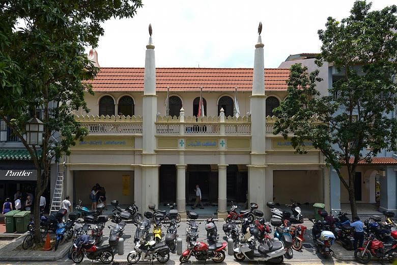A Chinese copy of the Quran in the mosque. Mr Arif, the mosque's secretary, said the place of worship is open to all - even tourists and other visitors who are not Muslims. Motorbikes parked before noon prayers. While the mosque serves mostly Indian 