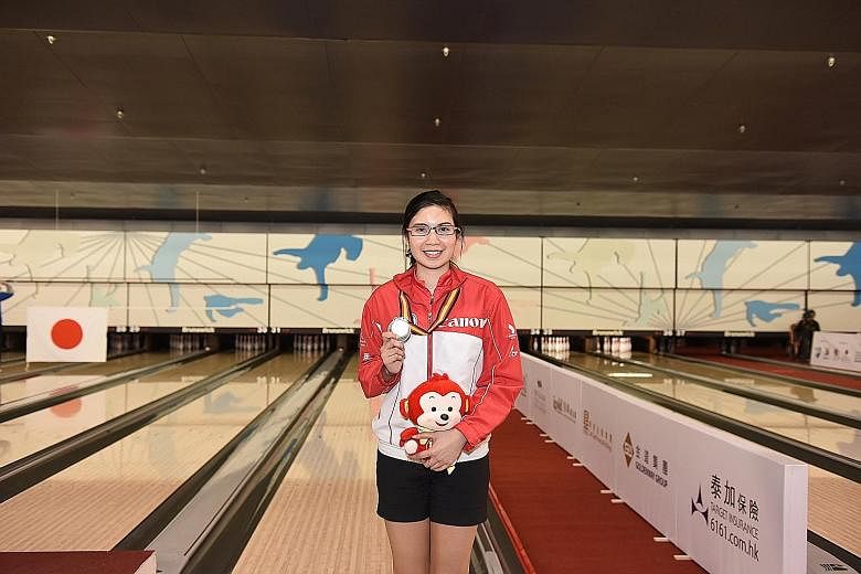National kegler Jasmine Yeong-Nathan (left) with her bronze from the women's Masters event at the Asian Bowling Championships in Hong Kong. She lost to eventual champion Jung Da Wun of South Korea in the step-ladder semi-final 224-177.