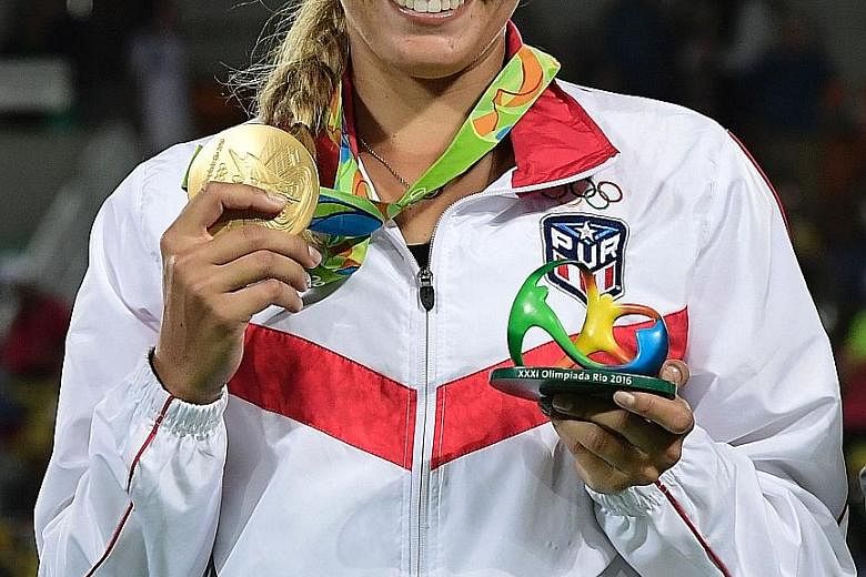 World No. 27 Monica Puig admits that it has been difficult adjusting to her new status as Olympic champion.