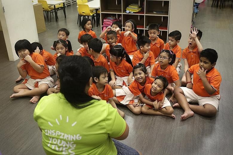 Children in a K2 class participating in Children's Day celebrations at My First Skool in Chin Swee Road yesterday. NTUC First Campus said there are now 12 programmes - from three in 2008 - to meet the social needs of its pre-schoolers, such as improv
