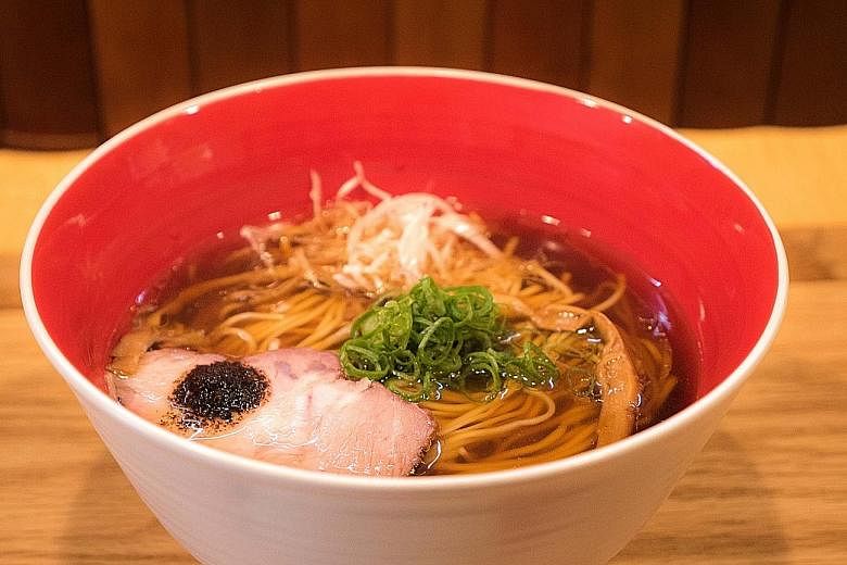 Tsuta's Singapore menu will feature its signature shoyu (above) and shio ramen. Tsuta chef- owner Yuki Onishi created his ramen with a modern spin by adding Western ingredients.