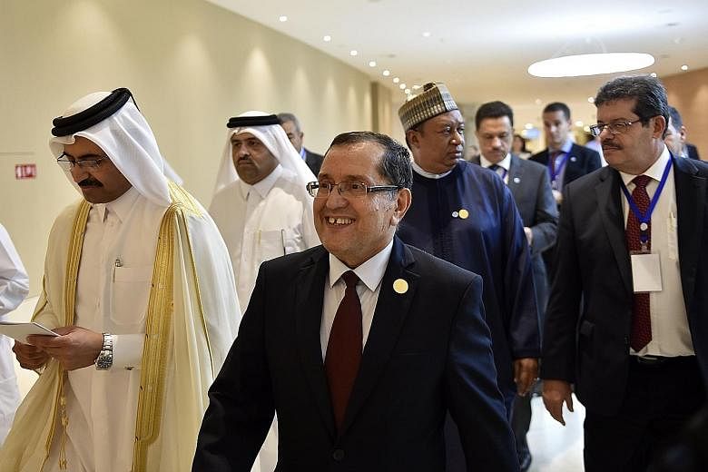 Algerian Energy Minister Noureddine Boutarfa (centre) and Opec president Mohammed bin Saleh al-Sada (left) arriving for a press conference after an Opec meeting on Wednesday in the Algerian capital of Algiers.