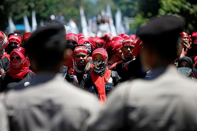 The protest march near the presidential palace in Jakarta yesterday.