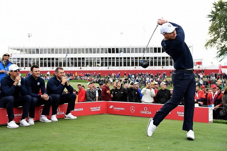 (From left to right) Martin Kaymer and Lee Westwood watch European team-mate Danny Willett hit off the tee during practice ahead of the Ryder Cup at Hazeltine National Golf Club in Chaska, Minnesota. Masters champion Willett is one of six rookies in 