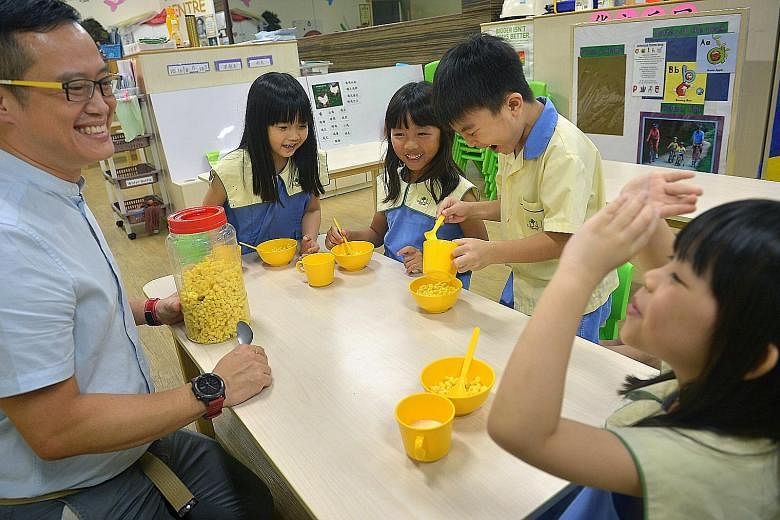 A research project on diabetics will focus on the lifestyle of pre-schoolers such as Carpe Diem @ ITE K2 pupils (from left) Low Yen Qi, Joyce Pek, Ng Guan Zhi and Kang Jia En, all six. With them is Mr Lorbert Tay, 42, the centre manager.