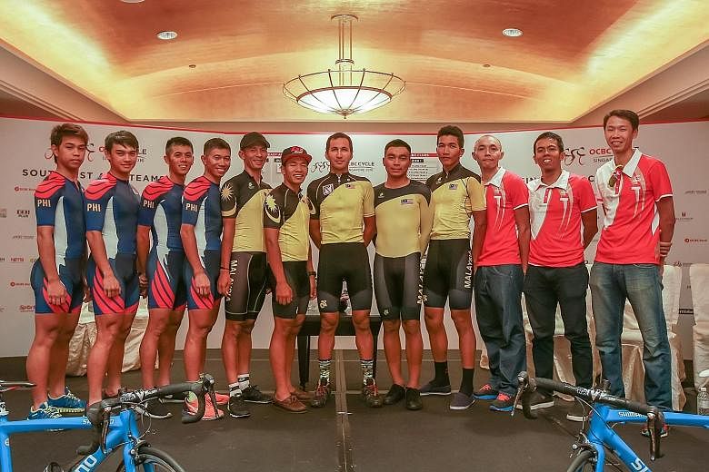 From left: The Philippines, Malaysia and Singapore teams line up for a photo call at Grand Copthorne Waterfront Hotel, ahead of this year's OCBC Cycle South-east Asia Speedway Championship.