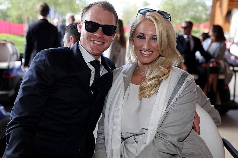 Danny Willett and his wife Nicole attending the Ryder Cup opening ceremony on Thursday. He has come under fire for disparaging comments written by his brother Peter on American golf spectators.