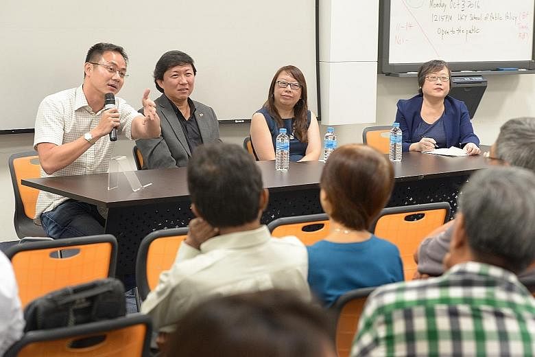 Mr Poon King Wang (far left) suggested staggering work hours to ease MRT congestion. With him are (from left) Mr Koh Buck Song, Ms Joanna Tan and Ms Cheong Suk-Wai.