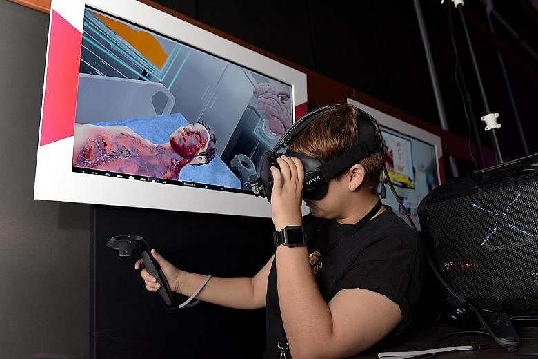 A demonstration of how virtual technology can be used for emergency room training. The newly minted Info-communications Media Development Authority is now in talks with restructured hospitals to use such technology.