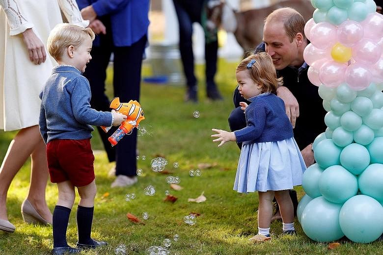 Britain's Princess Charlotte, one, has spoken for the first time in public during her family's Canadian tour, uttering the word "pop" while she and her brother played with balloons. Britain's Prince William and his wife Catherine, Duchess of Cambridg