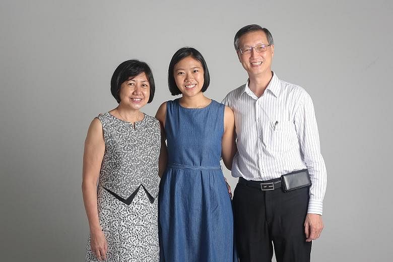 Nineteen-year-old Gabrielle Ong, flanked by mum Ng Kwee Heong and dad Benjamin Ong, has decided against pursuing a degree in favour of working first despite receiving offers from four local universities. She sees it as learning from the "university o