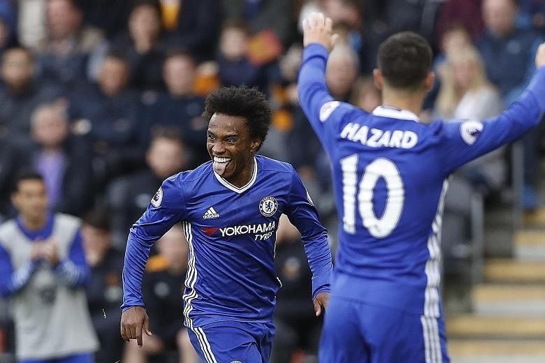 Chelsea fought hard for a 2-0 English Premier League win over Hull City yesterday, as they rebounded from two consecutive league defeats. The goals, coming in the space of seven minutes from Willian (61st, above) and Diego Costa (67th), moved the Blu