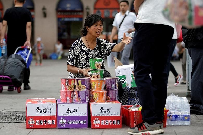 Instant noodles being sold at Beijing Railway Station in China. Just as China's economy has slowed, so too has its appetite for instant noodles.