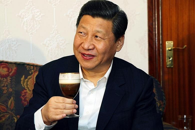 Mr Xi trying an Irish coffee during a visit to Lynch Farm in Ireland in 2012. When Mr Xi consumes a food item, its sales in China soar.