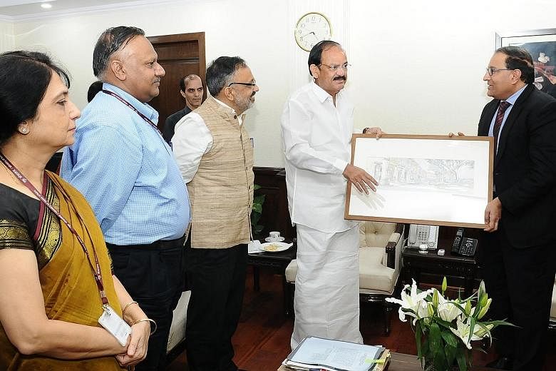 Mr Iswaran (far right) meeting Indian minister M. Venkaiah Naidu in New Delhi yesterday. With the two ministers are (from left) Dr Nandita Chatterjee, Secretary of the Ministry of Housing and Urban Poverty Alleviation; Mr Ajay Mittal, Secretary of th