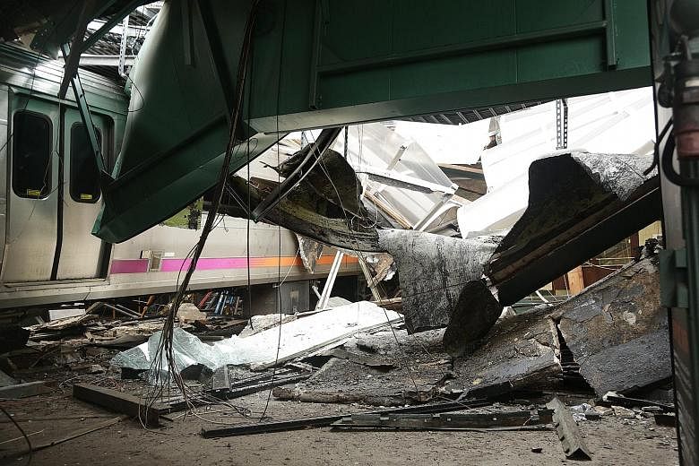 The derailed train, which killed a 34-year-old woman on the platform and injured 108 people at a Hoboken station last Thursday.