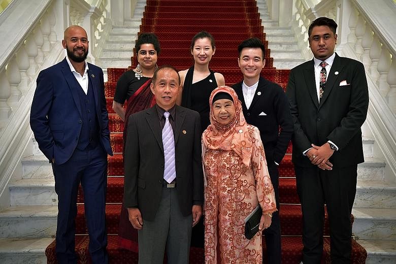 Cultural Medallion winners (front row, from left) Koh Mun Hong and Nona Asiah with Young Artist Award winners (back row, from left) Marc Nair, Pooja Nansi, Alecia Neo, Liu Xiaoyi and Ezzam Rahman, all of whom received their awards at a ceremony held 