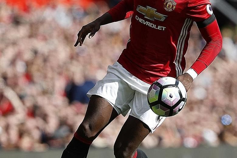 Manchester United midfielder Paul Pogba in action against Stoke City in the English Premier League. The world's most expensive footballer failed to lead his side to victory last Sunday, with the teams drawing 1-1 at Old Trafford.