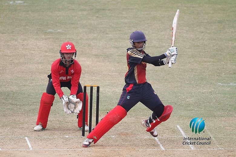 Hong Kong wicket-keeper Kabir Sodhi watching as Singapore's Rohan Rangarajan plays a shot to mid-wicket. Rohan was the Man of the Match after hitting 58 off 66 balls. It was his fourth straight half-century in the tournament.