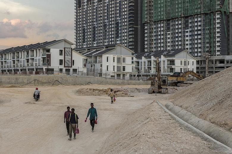 The Savanna Executive Suites complex under construction at Southville City in Selangor, Malaysia. Foreign ownership restrictions in emerging Asian markets are expected to be relaxed gradually in the coming years as those places seek to attract intern