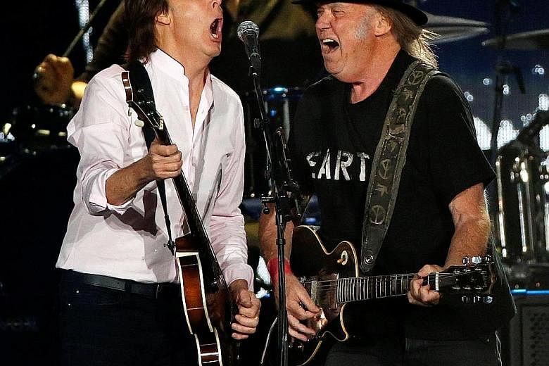 Paul McCartney (left) and Neil Young performed a mash-up that built into the anthem Give Peace A Chance.