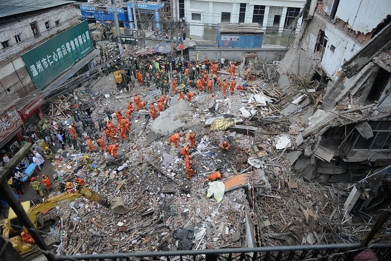 The collapse of a series of buildings built by local villagers and packed with migrant workers in China has killed at least 17 people, according to the government and reports. The four multi-storey residential buildings caved in during the early hour